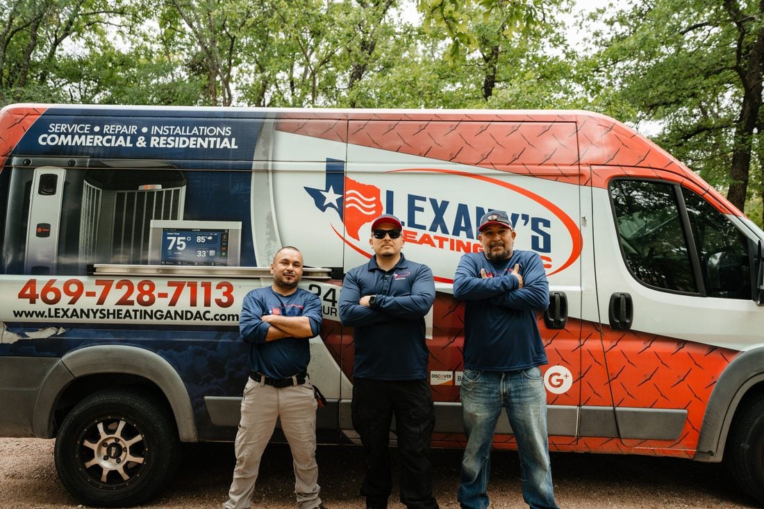 The Lexany's Heating & AC team in front of the company van